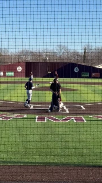 At bat — away game