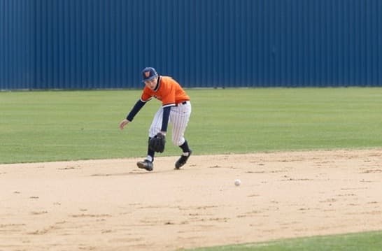 Fielding a grounder in the hole